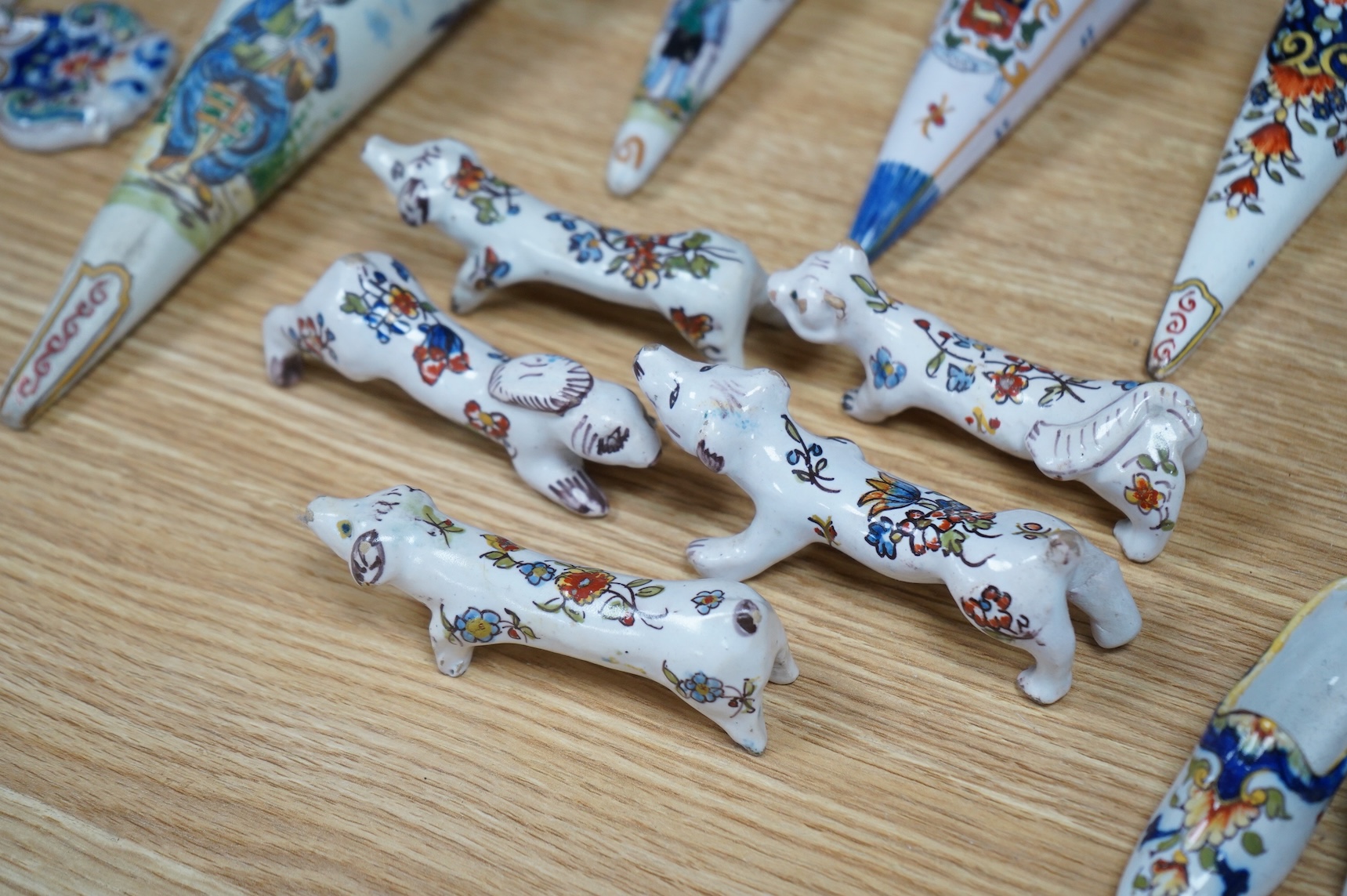 19th century French decorative faience including bag pipes, a large wall pocket, jardiniere etc (22).